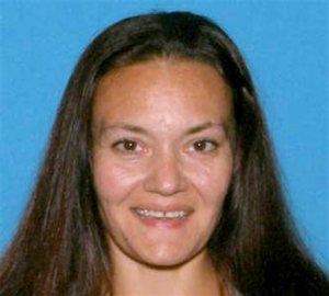 CORRECTS NAME TO RACHELLE FROM RACHEL - This undated identification photo released Friday, Sept. 18, 2015 by the Suffolk County District Attorney's Office shows Rachelle Bond, mother of Bella Bond, the toddler whose body was found in a trash bag on a Boston Harbor beach in June and who was known for months as only Baby Doe. Rachelle Bond was arrested and charged as an accessory to murder after the fact in Bella's death. Her boyfriend, Michael McCarthy, was charged with murder. (Suffolk County District Attorney's Office via AP)