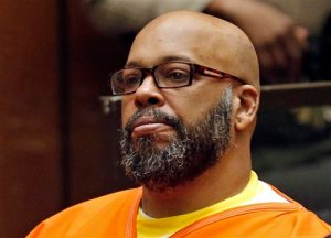 FILE - In this July 7, 2015, file photo, Marion Hugh "Suge" Knight sits for a hearing in his murder case in Los Angeles Superior Court. Knight is scheduled to return to a Los Angeles court on Thursday, Sept. 17, 2015, for a hearing in which prosecutors are expected to lay out evidence to support a robbery charge filed against the former rap music mogul and comedian Katt Williams, who are charged with a stealing a photographer's camera in Beverly Hills in September 2014. (Patrick T. Fallon/Pool Photo via AP, File)