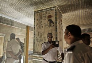 A policeman takes a selfie at the Amenhotep II tomb in the Valley of the Kings in Luxor, Egypt, Tuesday, Sept. 29, 2015. Egypt's antiquities minister says King Tut's tomb may contain hidden chambers, lending support to a British Egyptologist's theory that a queen may be buried in the walls of the 3,300 year-old pharaonic mausoleum. (AP Photo/Nariman El-Mofty)