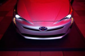 Toyota unveils the latest version of the Prius at an event Tuesday, Sept. 8, 2015, in Las Vegas. The car is still the No. 1 hybrid on the market but has been a tougher sell for dealers with gas prices below $3 in many areas of the country. (AP Photo/John Locher)