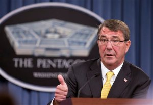 FILE - In this Aug. 20, 2015 file photo, Defense Secretary Ash Carter speaks during a news conference at the Pentagon. Carter spoke with his Russian counterpart Friday, the first step in direct military talks proposed by Russia about Moscow's military buildup to support the Syrian government against the Islamic State group.  (AP Photo/Manuel Balce Ceneta, File)