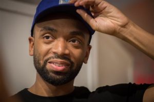 Pyer Moss collection designer Kerby Jean-Raymond appears backstage during Fashion Week Thursday, Sept. 10, 2015, in New York. (AP Photo/Bryan R. Smith)