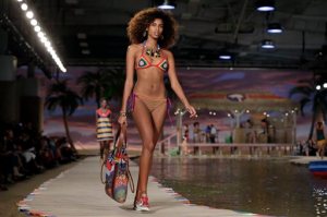 The Tommy Hilfiger Spring 2016 collection is modeled during Fashion Week in New York, Monday, Sept. 14, 2015. (AP Photo/Richard Drew)