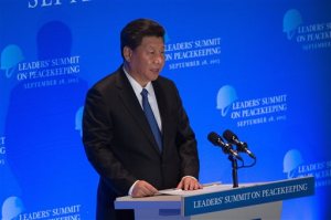 China's President Xi Jinping speaks at a leaders' summit on peacekeeping at United Nations headquarters Monday, Sept. 28, 2015. (AP Photo/Kevin Hagen)