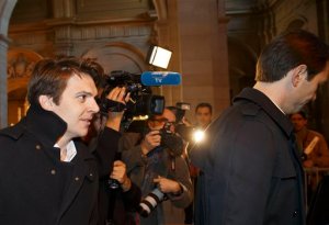 Pierre-Dimitri Gore-Coty, general manager for western Europe of California-based Uber, left, and Thibaud Simphal, manager of Uber France, right arrive at the court house in Paris, France, Wednesday, Sept. 30, 2015. Two Uber executives are facing the possibility of prison in a trial hinging on the ride-hailing service's outlawed low-cost service. The trial Wednesday of Pierre-Dimitri Gore-Coty and Thibaud Simphal, comes a week after France's top constitutional authority upheld a 2014 law banning the low-cost UberPop service, which allowed any driver to act as a taxi. Uber's standard app-based service remains legal in France. (AP Photo/Michel Euler)