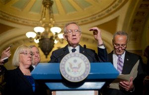 Senate Minority Leader Harry Reid of Nev., center, speaks to reporters on Capitol Hill in Washington, Wednesday, Sept. 9, 2015. Joining Reid from left are Sen. Patty Murray, D-Wash., Senate Minority Whip Richard Durbin of Ill.,  left, and Sen. Charles Schumer, D-N.Y., right. (AP Photo/Pablo Martinez Monsivais)