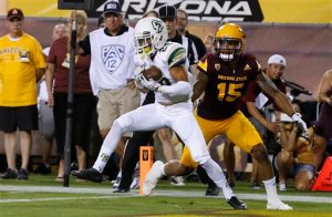 Cal Poly's Fernando Cabico (20) intercepts a pass intended for Arizona State's Devin Lucien (15) during the second half of an NCAA college football game Saturday, Sept. 12, 2015, in Tempe, Ariz. Arizona State defeated Cal Poly 35-21. (AP Photo/Ross D. Franklin)
