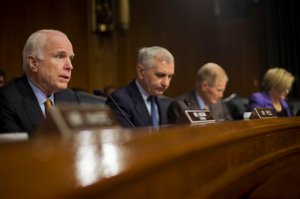 Senate Armed Services Committee Chairman Sen. John McCain, R-Ariz., left, questions US Central Command Commander Gen. Lloyd Austin III, on Capitol Hill in Washington, Wednesday, Sept. 16, 2015,during the committee's hearing on US military operations to counter the Islamic State in Iraq. From left are, McCain, the committee's ranking member, Sen. Jack Reed, D-R.I., Sen. Bill Nelson, D-Fla., and Sen. Claire McCaskill, D-Mo. (AP Photo/Pablo Martinez Monsivais)