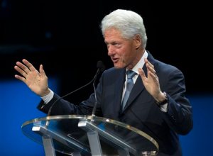 FILE - In this Aug. 29, 2015 file photo, former President Bill Clinton speaks in New Orleans. Bill Clinton is "ready to get out there" and campaign. With his wife facing an increasingly tough primary battle, the big dog is gearing up to get into the fight. (AP Photo/Max Becherer. File)