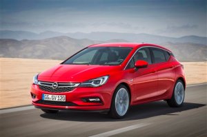 The photo released by General Motors shows the new Opel Astra. GMs redesigned Opel Astra will have its world premiere at the Frankfurt car show.  (Opel/GM via AP)