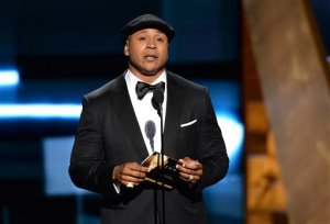 IMAGE DISTRIBUTED FOR THE TELEVISION ACADEMY - LL Cool J presents the award for outstanding variety talk series at the 67th Primetime Emmy Awards on Sunday, Sept. 20, 2015, at the Microsoft Theater in Los Angeles. (Photo by Phil McCarten/Invision for the Television Academy/AP Images)