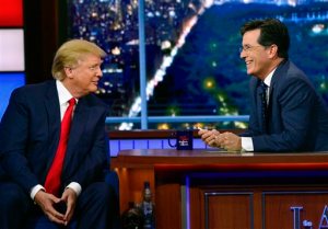 In this photo provided by CBS, Republican presidential candidate Donald Trump, left, joins host Stephen Colbert on the set of The Late Show with Stephen Colbert, Tuesday, Sept. 22, 2015, in New York. (John Paul Filo/CBS via AP) MANDATORY CREDIT; NO ARCHIVE; NO SALES; NORTH AMERICAN USE ONLY
