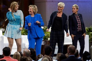 Actress Amy Schumer, left, Democratic presidential candidate Hillary Rodham Clinton, second from left, Ellen DeGeneres and musician Pink dance on stage during a taping of The Ellen DeGeneres Show, Tuesday, Sept. 8, 2015, at Rockefeller Center in New York. (AP Photo/Mary Altaffer)