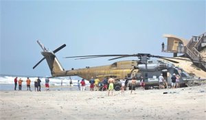 FILE -In this Wednesday, April 15, 2015 file photo, a Marine Corps CH-53E helicopter sits in the sand where it made an emergency landing in Solana Beach, Calif. One Marine has been killed and 9 others were hurt when a helicopter made a hard landing at Camp Lejeune in North Carolina, Wednesday night, Sept. 2, 2015. (AP Photo/Lenny Ignelzi, File)