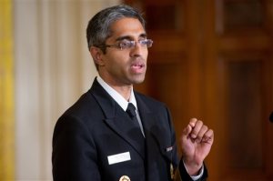 FILE - In this Aug. 3, 2015, file photo, U.S. Surgeon General Vivek Murthy speaks in the East Room at the White House in Washington. Take a walk: That's the U.S. surgeon general's prescription for sedentary Americans _ but communities will have to step up, too, and make neighborhoods easier and safer for foot traffic. Only half of adults and just over a quarter of high school students get the amount of physical activity recommended for good health, Murthy said in a "call to action" being issued Sept. 9. (AP Photo/Andrew Harnik, File)