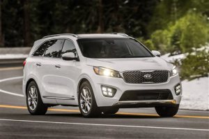 This product image provided by Kia Motors shows the 2016 Sorento 3.3-liter V6 SX-L. For 2016, the Kia Sorento sport utility vehicle is larger than its predecessor, has new, handsome styling and is surprisingly refined. (Kia Motors via AP)