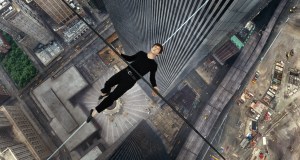 In this image released by Sony Pictures, Joseph Gordon-Levitt portrays Philippe Petite in a scene from, "The Walk." The film, about high-wire artist Phillippe Petits cabled walk between the Twin Towers in 1974, opened the 53rd New York Film Festival on Saturday, Sept. 26, 2015.  (Sony Pictures via AP)