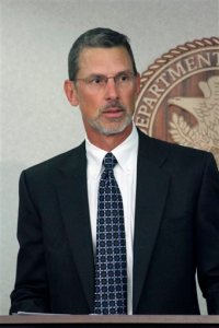 Steve Skrocki, an assistant U.S. Attorney in Alaska, and lead prosecutor, speaks during a news conference Monday, Sept. 14, 2015, in Anchorage, Alaska. Karen Loeffler, the U.S. attorney in Alaska, said multiple people associated with a cable hunting show face charges related to poaching in northwest Alaska. (AP Photo/Mark Thiessen)
