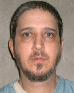 FILE - This undated file photo provided by the Oklahoma Department of Corrections shows death row inmate Richard Glossip. In a 3-2 decision, the Oklahoma Court of Criminal Appeals on Monday, Sept. 28, 2015, denied Glossip's request for an evidentiary hearing and an emergency stay of execution. The court ruled the state can proceed with Glossip's execution. (AP Photo/Oklahoma Department of Corrections, File)