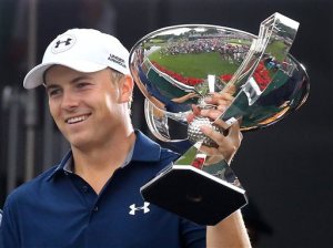 Jordan Spieth is presented the FedEx Cup after winning the Tour Championship golf tournament at East Lake Golf Club on Sunday, Sept. 27, 2015, in Atlanta. (Curtis Compton/Atlanta-Journal Constitution via AP) MARIETTA DAILY OUT, GWINNETT DAILY POST OUT, LOCAL TV OUT (WXIA, WGCL, FOX 5)