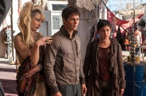 In this image released by 20th Century Fox, Jenny Gabrielle, from left, Dylan OBrien and Rosa Salazar appear in a scene from the film, "Maze Runner: The Scorch Trials." (Richard Foreman, Jr./20th Century Fox via AP)