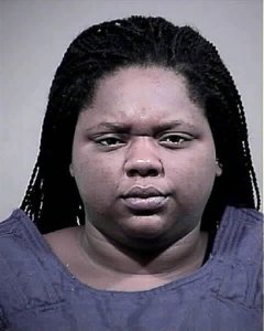 This handout photo provided by the Charles County, Md. Sheriff's Office shows Romechia Simms. A Maryland woman who was found pushing her dead son in a playground swing earlier this year has been indicted and charged with manslaughter and child abuse, authorities announced Monday.  (Charles County, Md. Sheriff's Office via AP)