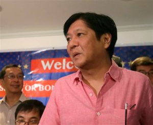 Philippine Senator Ferdinand "Bongbong" Marcos Jr. arrives for a media forum Wednesday, Oct.7, 2015, two days after announcing he is seeking the nations second highest office in next years national elections, at suburban Quezon city northeast of Manila, Philippines. Marcos Jr., the son of the late strongman Ferdinand Marcos,  said that Filipinos are no longer concerned with abuses committed under his fathers rule, angering human rights activists who say he wants people to forget his fathers strongman rule that a popular revolt ended 29 years ago. (AP Photo/Bullit Marquez)