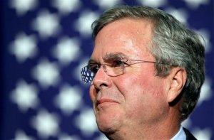 In this Oct. 6, 2015, file photo, Republican presidential candidate former Florida Gov. Jeb Bush speaks during the Scott County Republican Party's Ronald Reagan Dinner in Davenport, Iowa. Medical records released by Bush indicate the 62-year-old Republican presidential candidate is "healthy and vigorous" and in condition to serve as president if elected. An affidavit signed by Bushs doctor says the former Florida governor takes cholesterol medication. Dr. Alberto A. Mitrani says Bushs blood pressure and weight have dropped due to dieting and exercise, putting him in "excellent physical and mental condition." (AP Photo/Charlie Neibergall, File)