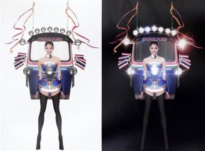 This illustration released Wednesday, Oct. 7, 2015, by Miss Universe Thailand Organizer shows Miss Universe Thailand 2015 Aniporn Chalermburanawong wearing a dress that looks like a tuk-tuk," a three-wheeled motorized taxi. The "Tuk Tuk Thailand" dress will be worn by Aniporn in the costume round at the pageant in December in the United States. It was the winning design from 356 entries in a contest held by Miss Universe Thailand. (Miss Universe Thailand Organizer via AP)