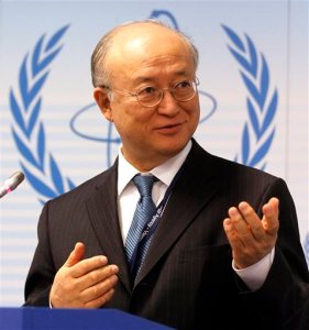 File-This April 4, 2011, file photo shows Director General of the International Atomic Energy Agency, IAEA, Yukiya Amano from Japan speaking during a news conference of the IAEA's Parties to Nuclear Safety Convention Hold Review at the International Center in Vienna, Austria. The head of the U.N. nuclear agency is heading to Tehran for high-level meetings as he tries to accelerate his probe of allegations that Iran worked in the past on nuclear weapons. Fredrik Dahl of the U.N's International Atomic Energy Agency said that Amano's meetings Sunday, Sunday, Sept. 20, 2015, are aimed at "clarifications of past and present outstanding issues" linked to the agency's probe. (AP Photo/Ronald Zak, File)