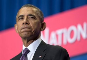 FILE - In this Oct. 4, 2015, file photo, President Barack Obama pauses as he speaks in Emmitsburg, Md. The White House is expected to announce Monday, Oct. 5, the designation of two new marine sanctuaries in the tidal waters of Maryland and Wisconsins Lake Michigan, the first chosen in 15 years. (AP Photo/Carolyn Kaster, File)