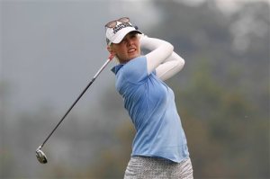 Jessica Korda of the United States watches her approach shot into the sixteenth green during the final round of LPGA Malaysia golf tournament at Kuala Lumpur Golf and Country Club in  Kuala Lumpur, Malaysia, Sunday, Oct. 11, 2015.(AP Photo/Joshua Paul)