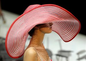 A model wears a creation for Giorgio Armani women's Spring-Summer 2016 collection, part of the Milan Fashion Week, unveiled in Milan, Italy, Monday, Sept. 28, 2015. (AP Photo/Antonio Calanni)