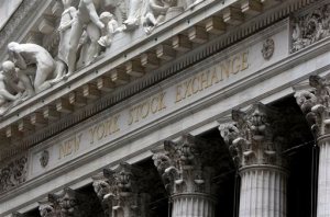 FILE - This Oct. 2, 2014, file photo, shows the facade of the New York Stock Exchange. Global stock markets were lower Tuesday, Oct. 27, 2015, as investors awaited monetary policy announcements from central banks and the outcome of China's economic planning meeting. (AP Photo/Richard Drew, File)