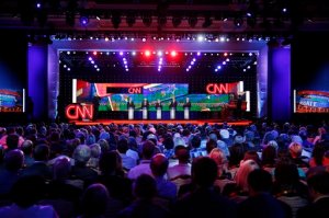 Democratic presidential candidates from left, former Virginia Sen. Jim Webb, Sen. Bernie Sanders, of Vermont, Hillary Rodham Clinton, former Maryland Gov. Martin O'Malley, and former Rhode Island Gov. Lincoln Chafee stand on stage during the CNN Democratic presidential debate Tuesday, Oct. 13, 2015, in Las Vegas. (AP Photo/John Locher)
