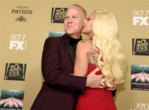 Lady Gaga, right, kisses executive producer/director/writer Ryan Murphy as they arrive at the Los Angeles premiere screening of "American Horror Story: Hotel" at Regal Cinemas L.A. (Photo by Chris Pizzello/Invision/AP)