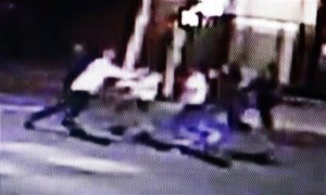 This frame from video provided by A&P Liquors, shows a group of people, including U.S. airman Spencer Stone, fighting outside a bar in Sacramento, Calif., in the early hours of Thursday, Oct. 8, 2015. Stone, who helped stop a terror attack on a French train in August, was stabbed and wounded, but is expected to survive. (A&P Liquors via AP)