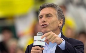 FILE - In this Oct. 3, 2015, file photo, opposition presidential candidate Mauricio Macri speaks to supporters at the opening rally of his campaign in Buenos Aires, Argentina. General elections are set for Oct. 25. Macri has vowed to negotiate a resolution in the bitter fight between Argentina and a group of holdout creditors in the U.S. (AP Photo/Natacha Pisarenko,File)