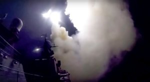 In this photo made from the footage taken from Russian Defense Ministry official web site, Wednesday, Oct. 7, 2015, a Russian navy ship launches a cruise missile in the Caspian Sea. Russia's Defense Minister Sergei Shoigu said four Russian navy ships in the Caspian launched 26 cruise missiles at Islamic State targets in Syria.(Russian Defense Ministry Press Service via AP)
