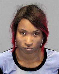 This photo provided by the Auburn Hills, Mich., Police Department shows Breianna Smart of Pontiac, Mich. Smart was caught in a dash cam video on Oct. 23, 2015 in a confrontation with an officer that shows her backing up her car at high speed and slamming him into his patrol car in Auburn Hills. Smart was arrested and charged with fleeing and eluding police and assaulting, resisting or obstructing an officer causing injury. The policeman was hurt but has returned to work. (Auburn Hills Police Department via AP)