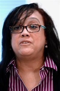 Renita Hill, who appeared on an educational children's TV show as a teenager with Bill Cosby in the 1980s, gives a statement during a news conference about a lawsuit against Cosby, Thursday, Oct. 15, 2015, in Pittsburgh. Hill claims he defamed her after she gave an interview claiming he sexually abused her in the 1980's. (AP Photo/Keith Srakocic)