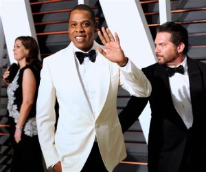 FILE - In this Feb. 23, 2015 file photo, Jay Z arrives at the 2015 Vanity Fair Oscar Party in Beverly Hills, Calif. The rapper says he believes he has a valid license to use the Arabic music featured on his 1999 hit Big Pimpin that is now the subject of a copyright infringement trial. Jay Z and music producer Timbaland contend they have the proper rights to use the notes, but a jury will determine whether that is the case when a copyright infringement trial over the song draws to a close on Tuesday, Oct. 20, 2015. (Photo by Evan Agostini/Invision/AP, File)