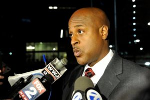 Eric Jones, interim executive fire commissioner talks with media in Detroit, Tuesday, Oct. 20, 2015. Jones tells reporters two emergency medical technicians responded to a 911 call and were treating the woman for an injured ankle when the man attacked one of the EMTs. Jones says the other EMT tried to intervene and was attacked. (David Coates/The Detroit News via AP)