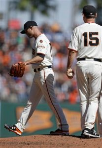 San Francisco Giants pitcher Tim Hudson walks off the mound after being removed by manager Bruce Bochy (15) from the baseball game against the Los Angeles Dodgers in the third inning Thursday, Oct. 1, 2015, in San Francisco. (AP Photo/Ben Margot)