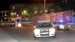 Police officers leave the campus of Tennessee State University early Friday, Oct. 23, 2015, in Nashville, Tenn. Authorities say one person was killed and two others hospitalized in a shooting Thursday night at an outdoor courtyard. A campus spokesperson said the person killed wasn't enrolled at the school. (AP Photo/Mark Humphrey)