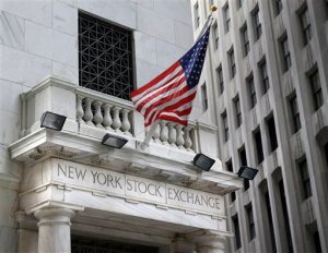 FILE - This Monday, Aug. 24, 2015, file photo, shows the New York Stock Exchange. Stocks were largely steady on Monday, Oct. 26, 2015, after gains in Asian trading, as investors hoped major central banks will maintain or expand their monetary stimulus policies. (AP Photo/Seth Wenig, File)
