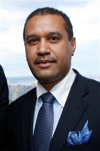 FILE - In this April 27, 2010 file photo, Francis Lorenzo, Deputy Ambassador of the Dominican Republic to the United Nations, attends a party held in honor of the Miss Italy beauty pageant in New York. Lorenzo and five others from the United Nations were charged Tuesday, Oct. 6, 2015 in a bribery scheme by federal prosecutors in New York.  (Jason DeCrow/AP Images for Miren International, File)