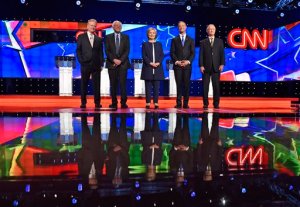 Democratic presidential candidates from left, former Virginia Sen. Jim Webb, Sen. Bernie Sanders, of Vermont, Hillary Rodham Clinton, former Maryland Gov. Martin O'Malley, and former Rhode Island Gov. Lincoln Chafee take the stage before the CNN Democratic presidential debate Tuesday, Oct. 13, 2015, in Las Vegas. (AP Photo/David Becker)