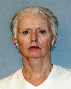 FILE - This undated file photo provided in 2011 by the U.S. Marshals Service shows Catherine Greig, the longtime girlfriend of Whitey Bulger, sentenced in 2012 to an eight-year prison term for conspiracy to harbor a fugitive, identity fraud and conspiracy to commit identity fraud. Greig is scheduled to be in federal court Monday, Oct. 19, 2015, in Boston to face a contempt charge for refusing to tell whether other people helped Bulger during his 16 years on the run. (U.S. Marshals Service via AP, File)