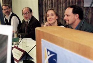 File - In this April 15, 1999 file photo, Geoffrey Marcy, right, then a professor at San Francisco State University, sits with Tim Brown, a senior scientist for the National Center for Atmospheric Research, from left, Robert Noyes, a professor at the Harvard-Smithsonian Center for Astrophysics, and Debra Fischer, a post-doctoral researcher at SFSU, at a news conference in San Francisco. The University of California, Berkeley is defending its handling of sexual harassment complaints against Marcy, a prominent astronomer, amid accusations that the professor was inadequately disciplined for inappropriate behavior with students. (AP Photo/Randi Lynn Beach, file)